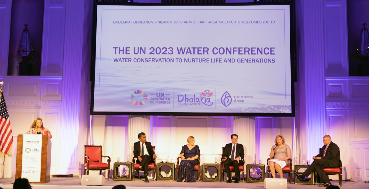 signet ceo gina drosos speaking on stage at united nations water conference